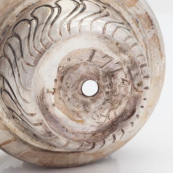 A silver plated brass Holy water bowl stamped L.G and dated 1774.
