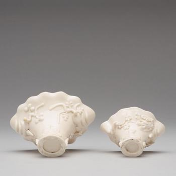 Two blanc de chine rhinoserous libation cups, Qing dynasty, Kangxi (1662-1722).