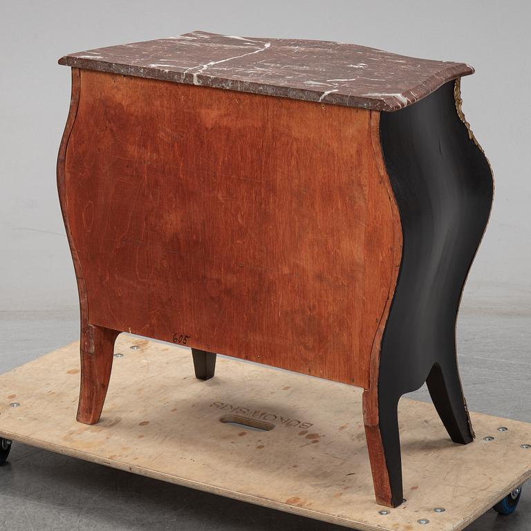 A mid 20th Century rococo style chest of drawers.