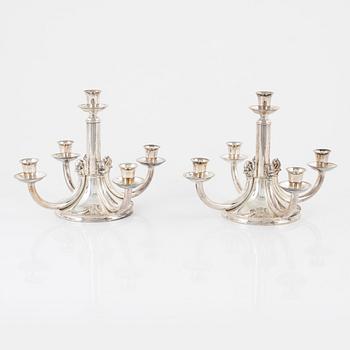 A pair of silver plated candelabra, bearing the mark of Atla, Denmark, second half of the 20th Century.