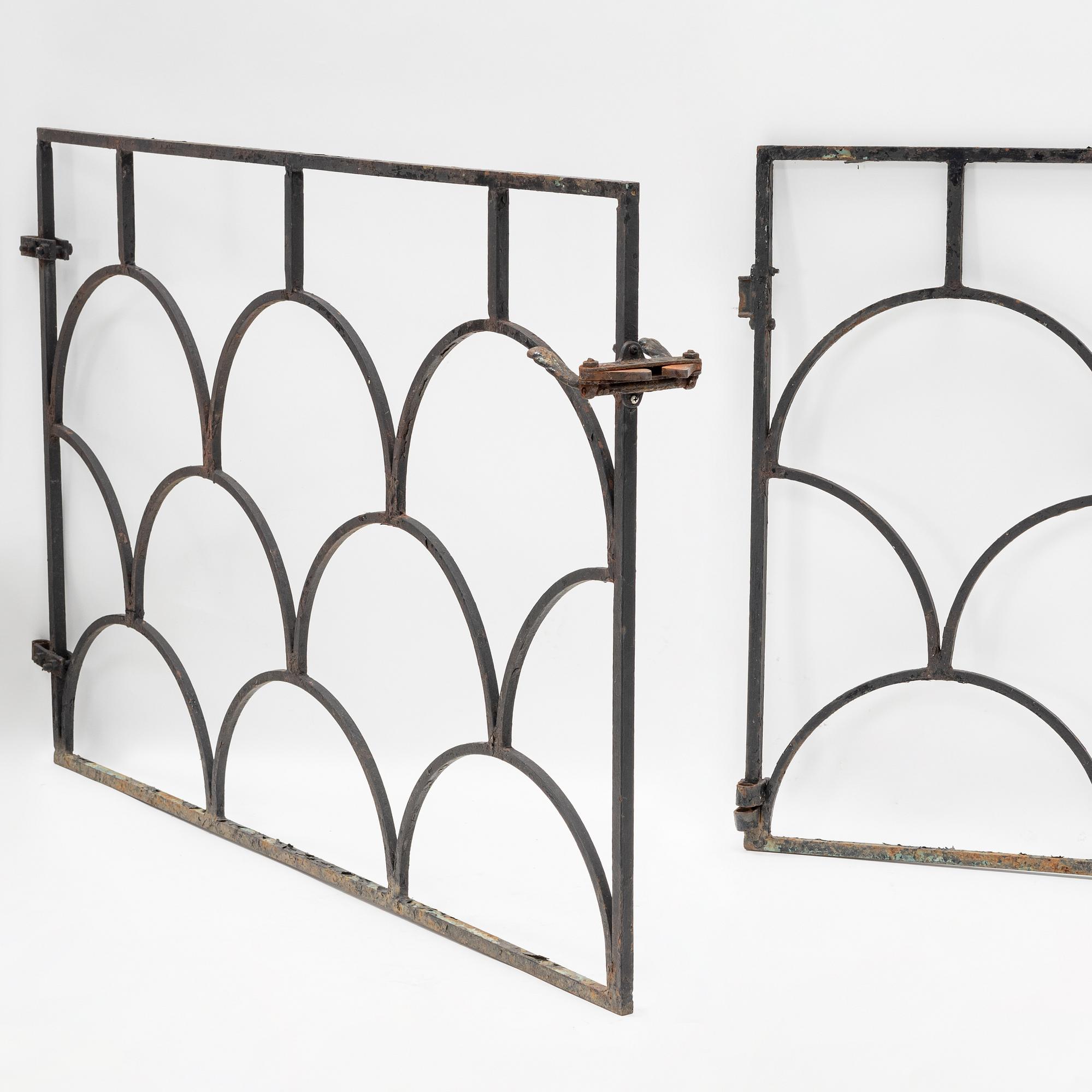 A pair of cast iron gates, 1930's.