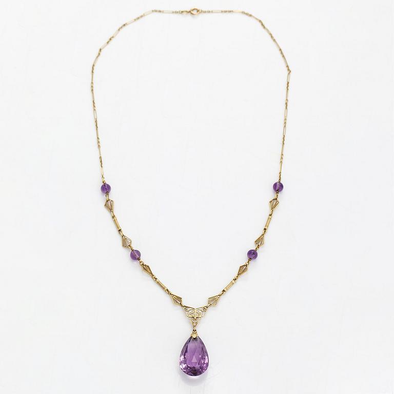 A 14K gold and amethyst neckalce.