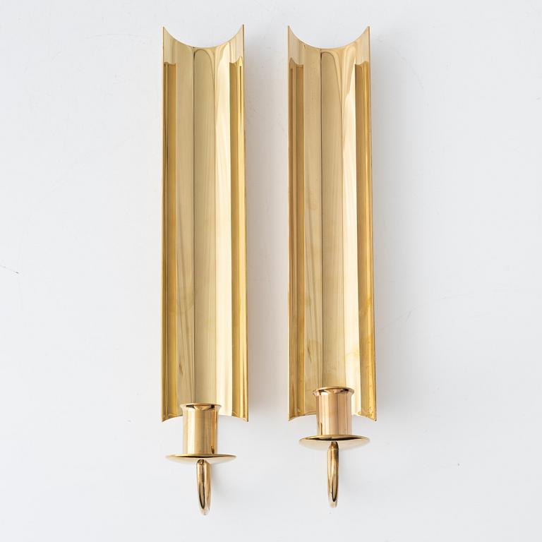 Pierre Forssell, a pair of 'Reflex' brass wall sconses, Skultuna.