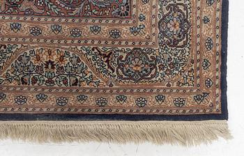 A Persian carpet, c. 222 x 140cm.