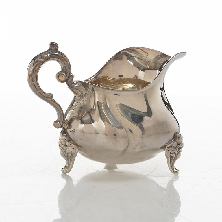 Wilhelm T Binder, sugar bowl, creamer, tray and sugar tong, silver, Schwäbisch Gmünd, Germany, 20th century.