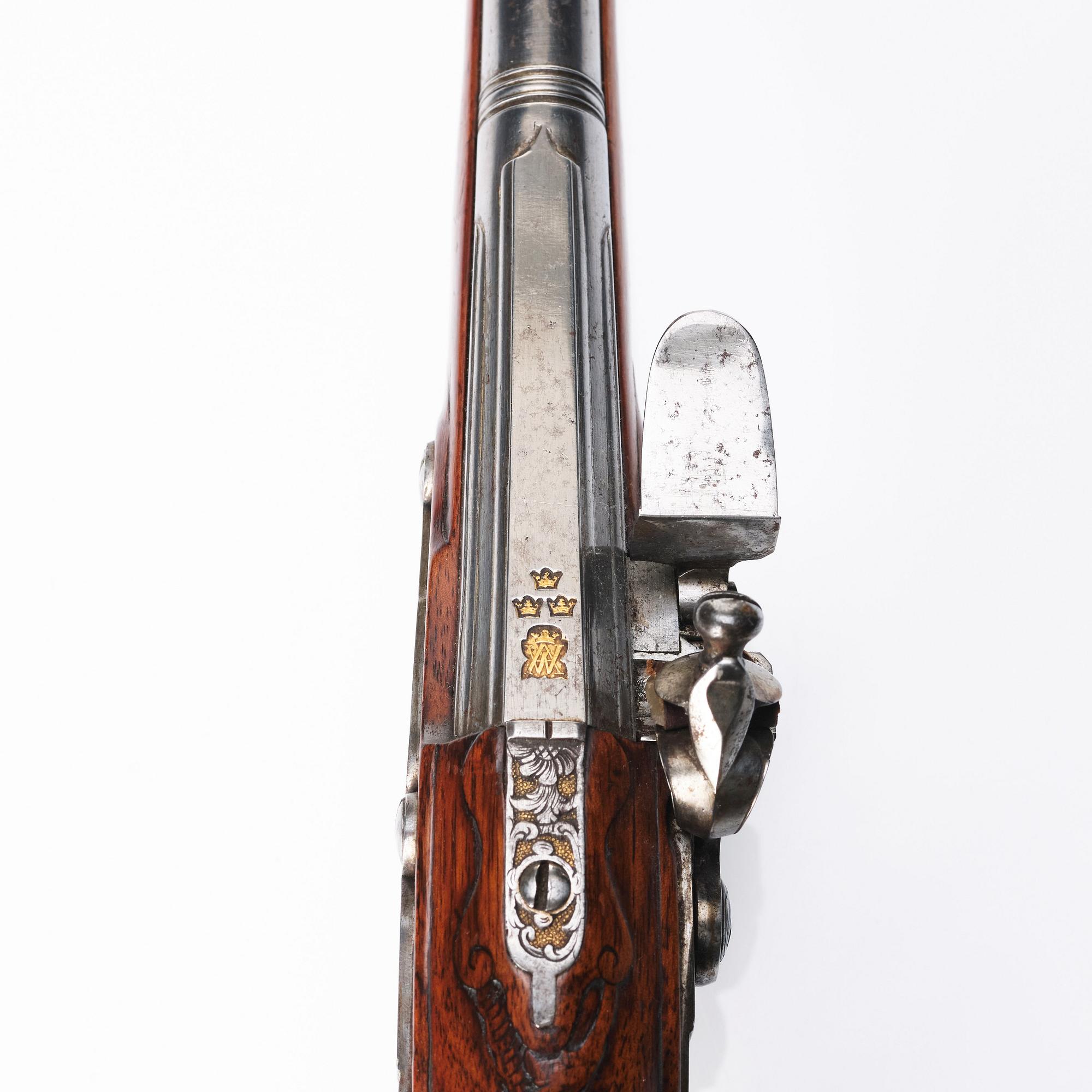 A flintlock pistol signed by Anders Wåhlberg Stockholm, (1720-93).