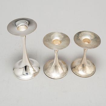 TAPIO WIRKKALA, three 'Trumpetti' silver candlesticks from Kultakeskus Oy, Hämeenlinna, Finland, 1974-93.