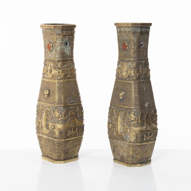 A pair of Chinese gilt bronze vases, Qing dynasty (1644-1912).
