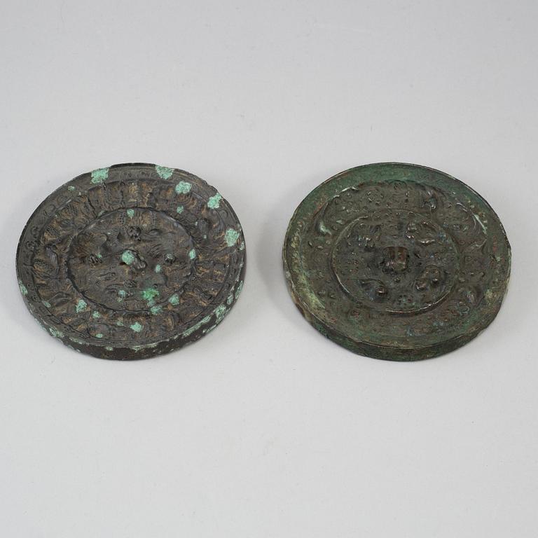 Two bronze mirrors with mythical animals, Tang dynasty (618–907).