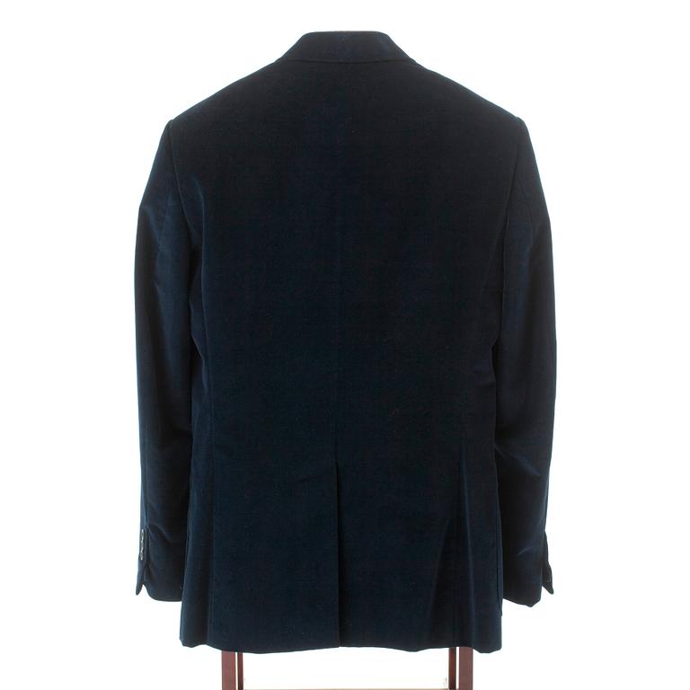 YVES SAINT LAURENT, a blue velvet jacket.