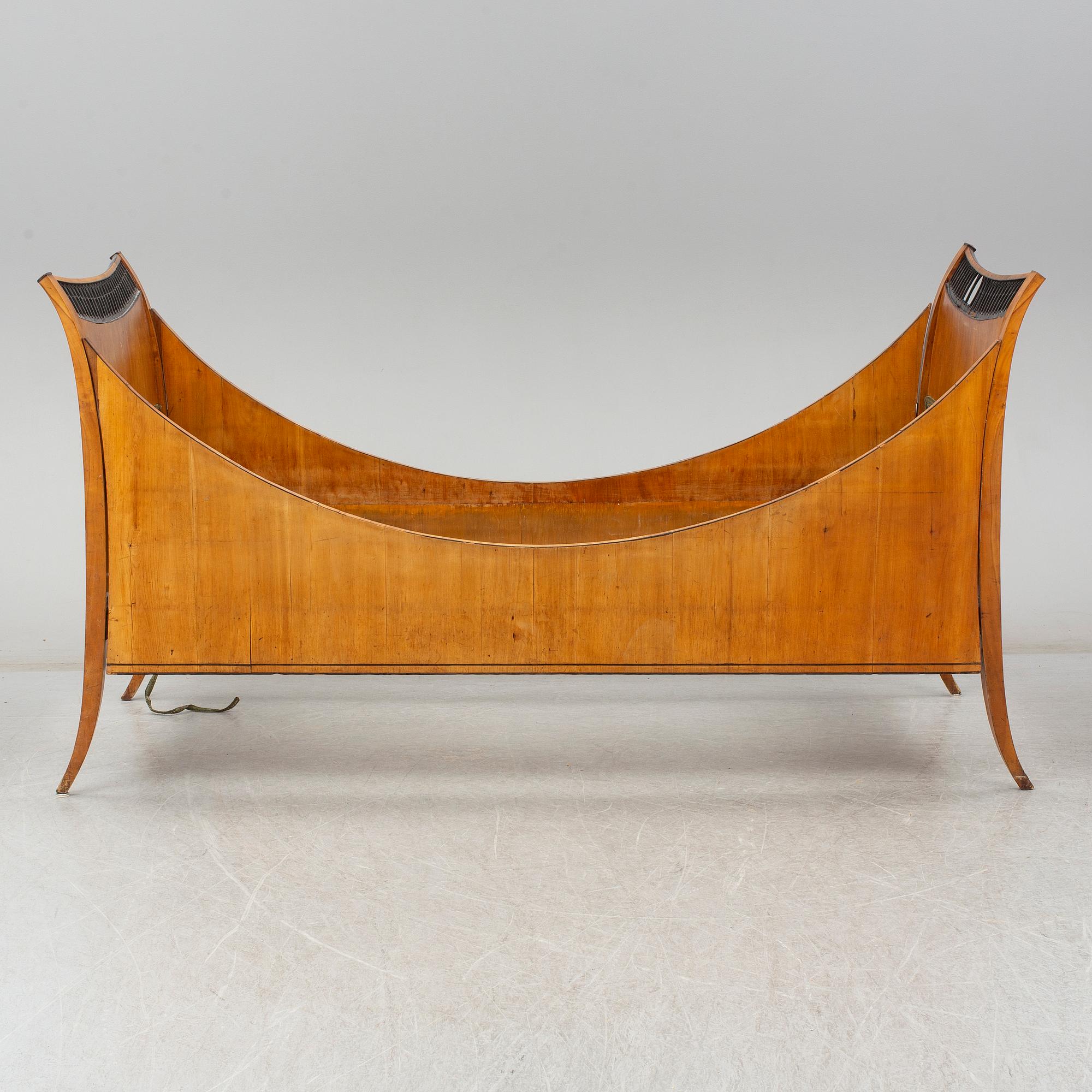 A mid 19th century Biedermeier bedframe.