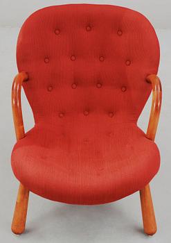 A 1940's-50's 'Clam chair' attributed to Philip Arctander for Möbelstil, Jönköping, Sweden.