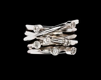 512. RING, sju briljantslipade diamanter, tot. 0.56 ct. Handgjort.