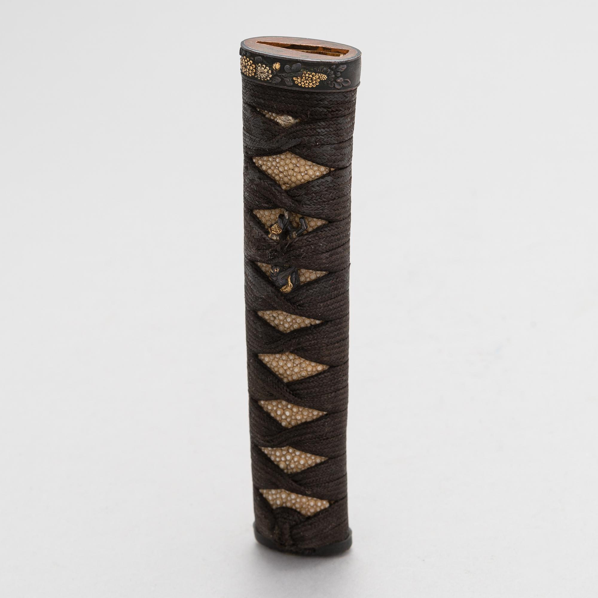 Japanese sword mountings, tsuba and tsuka.