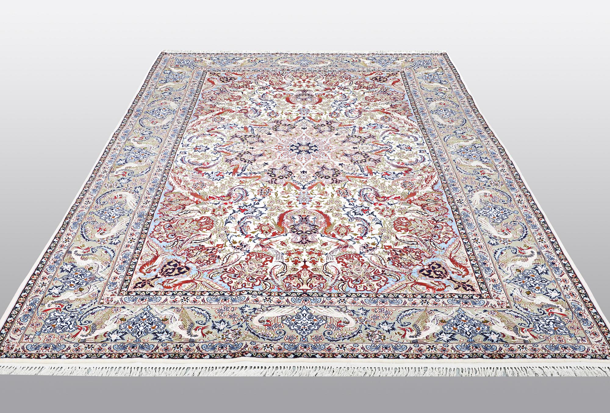 A carpet, Old Esfahan, part silk, ca 308 x 202 cm.