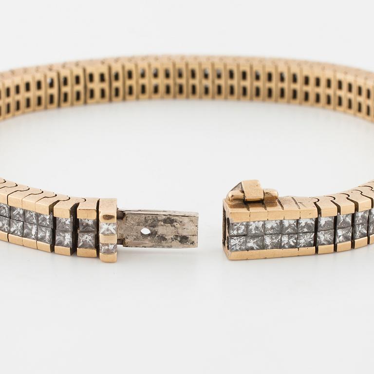 A princess cut diamond bracelet.