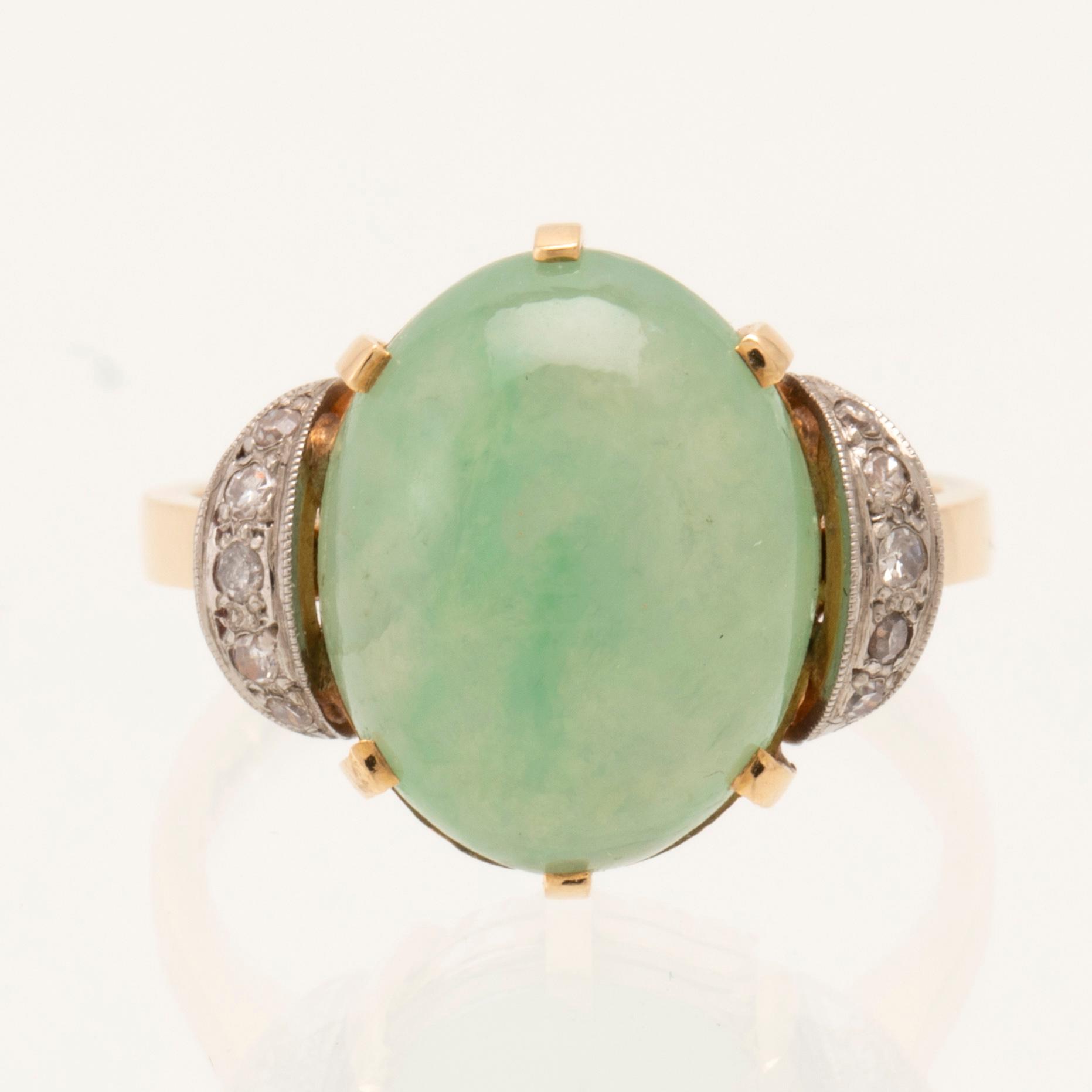 Börje Löfgren, ring in 18K white and red gold with an oval cabochon-cut jadeite and single-cut diamonds, Stockholm 1964.