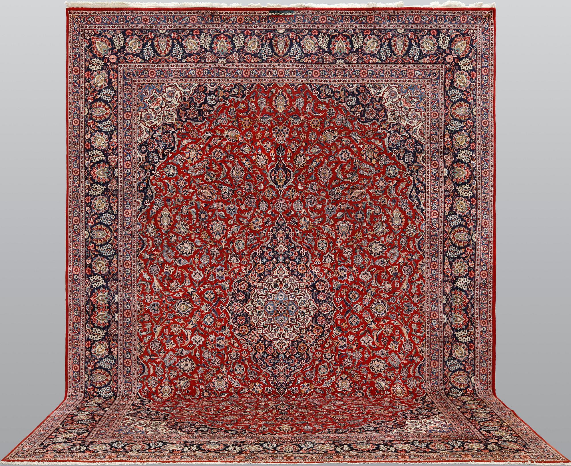 Carpet, Keshan, semi-antique, signed, 439 x 316 cm.