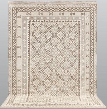 A Kilim carpet, c. 300 x 205 cm.