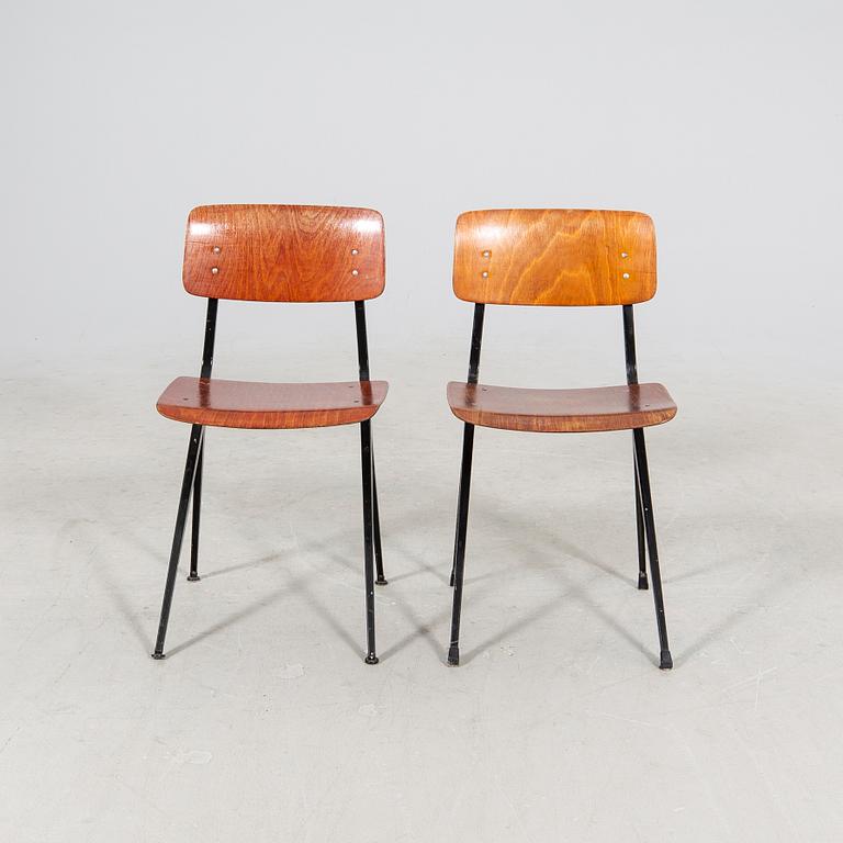 A pair of Friso Kramer Industrial 1950s chairs.