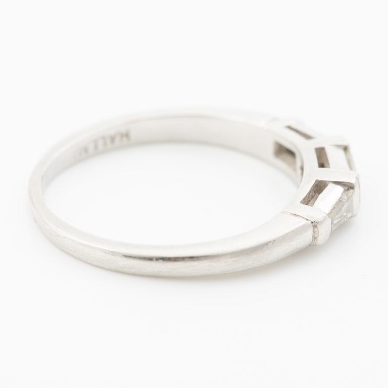 Platinum ring with baguette-cut diamonds.