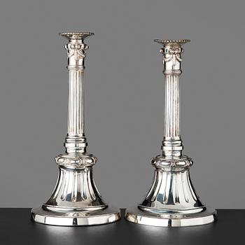 Two similar Gustavian late 18th century candlesticks.