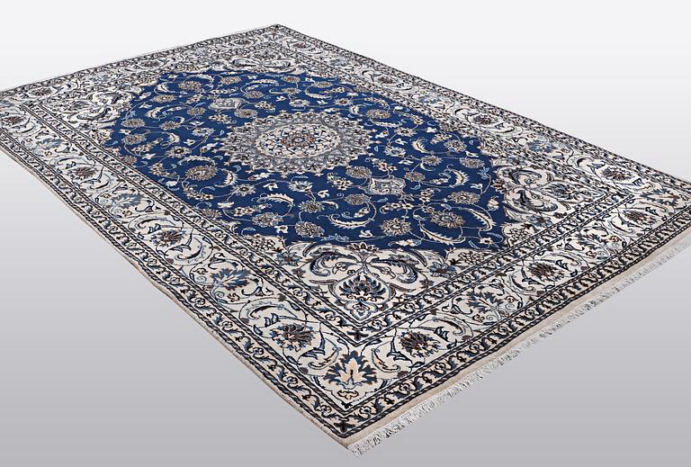 A carpet, Nain, part silk 9 LAA, ca 310 x 203 cm.