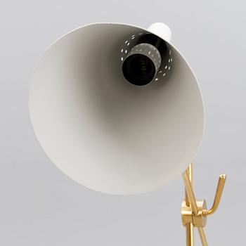 AN ADJUSTABLE FLOOR LAMP, K10-11. Manufactured by Idman Oy. Designed 1958.