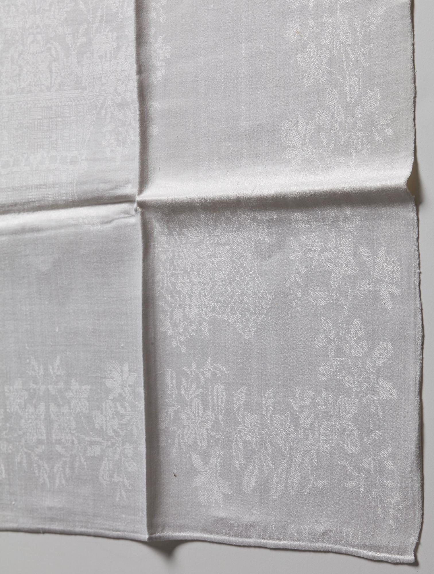 A TABLE CLOTH AND NAPKINS, 24 pieces, linen damask, the table cloth is dated 1827, ca 560-567 x 207,5 cm, Sweden 1827.