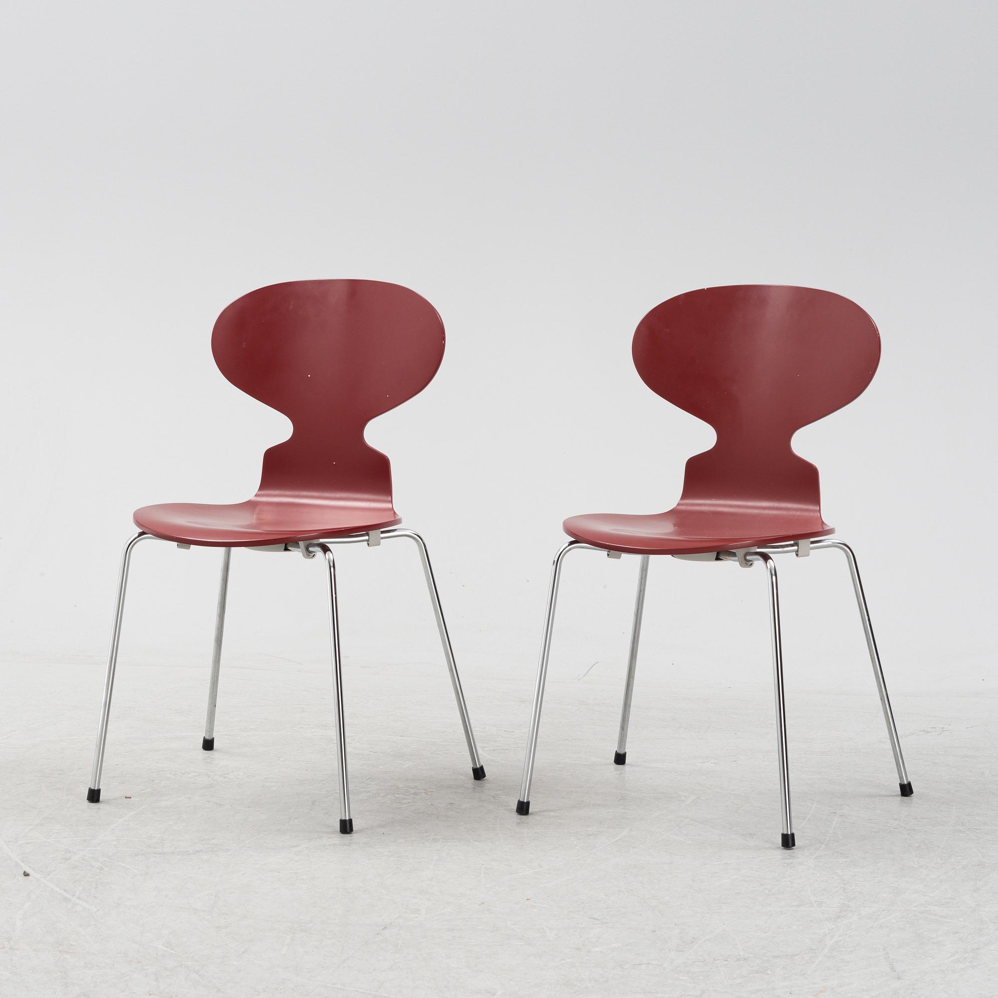 Arne Jacobsen, two 'The Ant' chairs, Frits Hansen, Denmark, 2003.