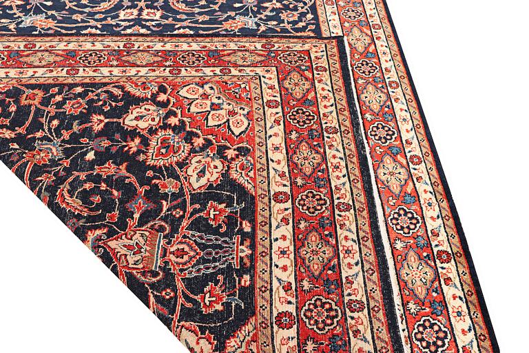 A Hamadan carpet, c. 312 x 216 cm.