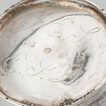 Beaker, silver 1835, cream-jug, silver 1826 and bread-plate, silver 1952.