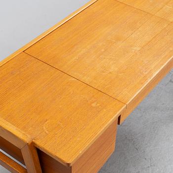 A 1960's teak dressing table.