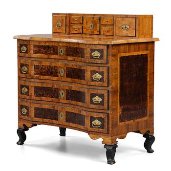 2. A Swedish late-Baroque burr-alder commode, first part 18th century.