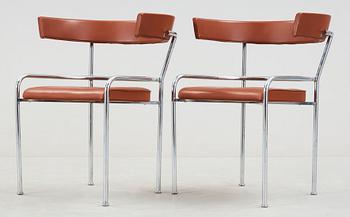 A pair of Gunnar Asplund chromed steel and leather armchairs by Källemo, Sweden post 1988.