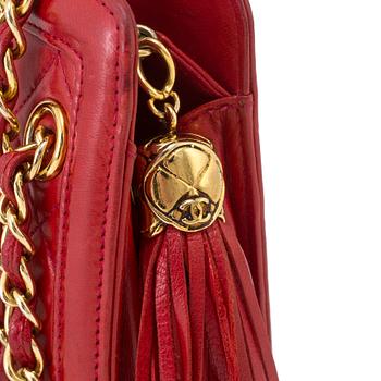 Handbag by Chanel.