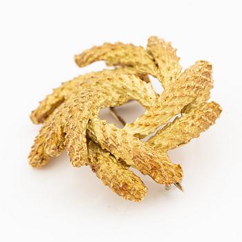 Brosch Hermès 18K guld i form av krans.