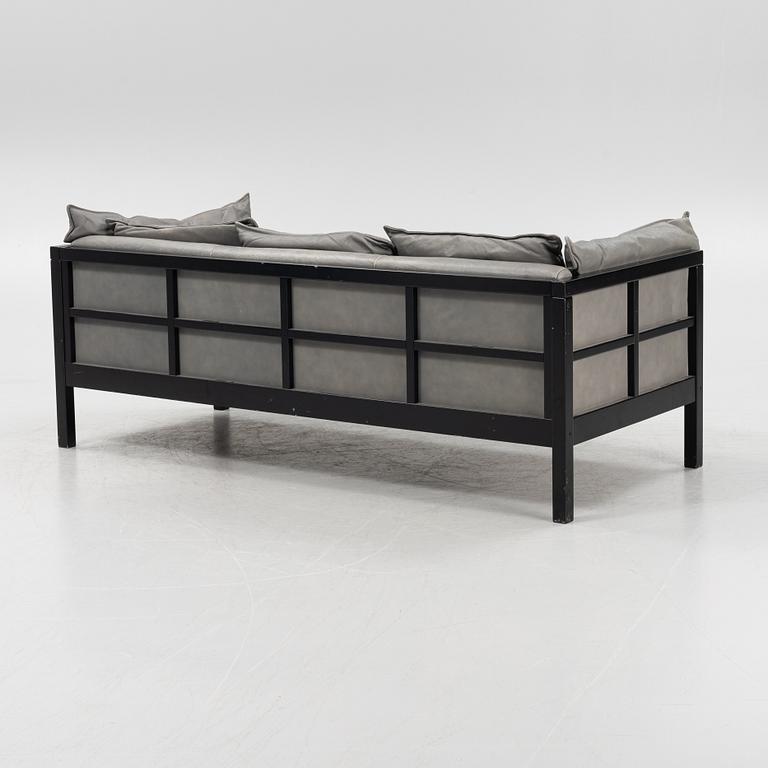 A lether sofa, later part of the 20th Century.