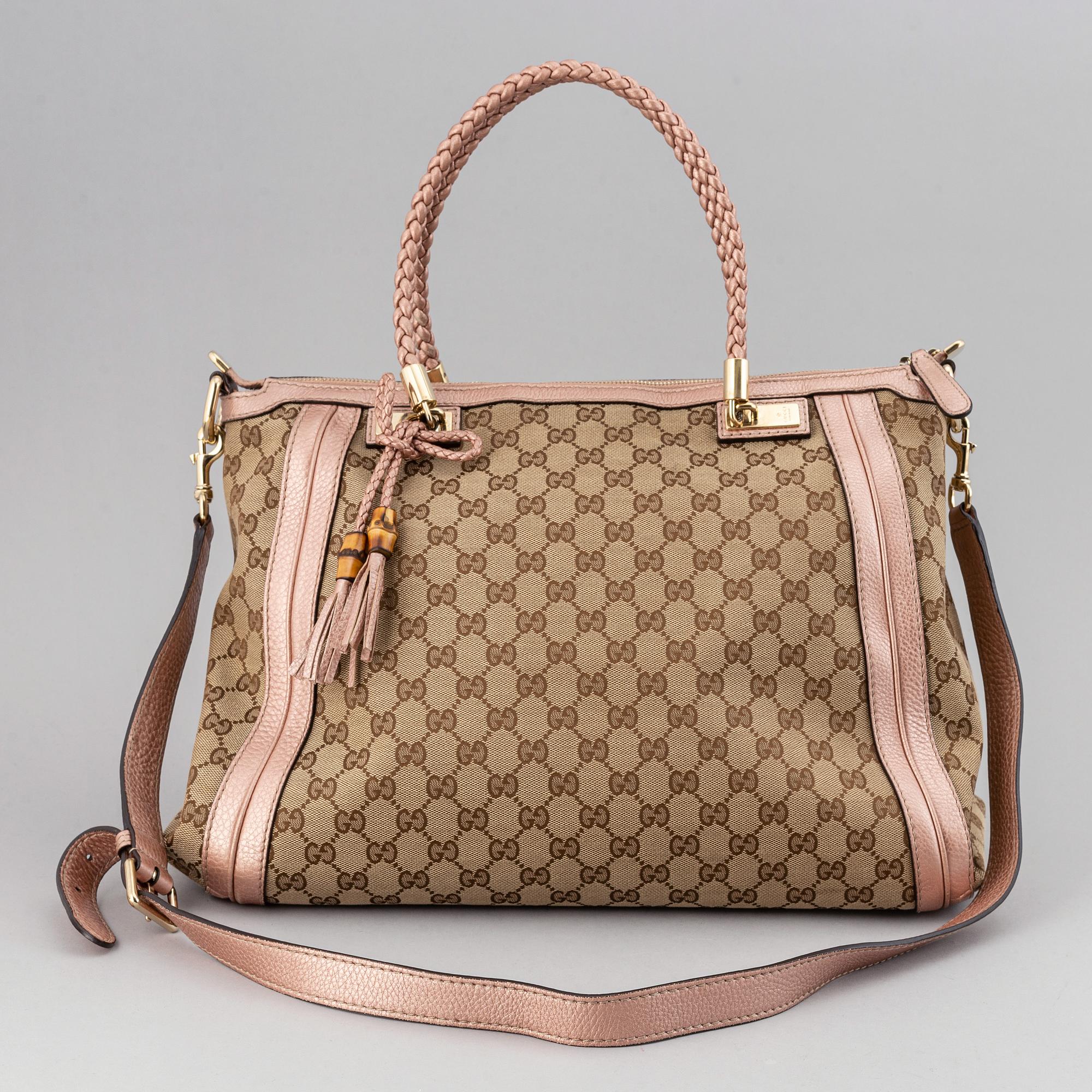 Gucci, a monogram canvas bag.