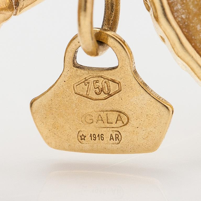 Rosato, An 18K gold brecelet with enamel.