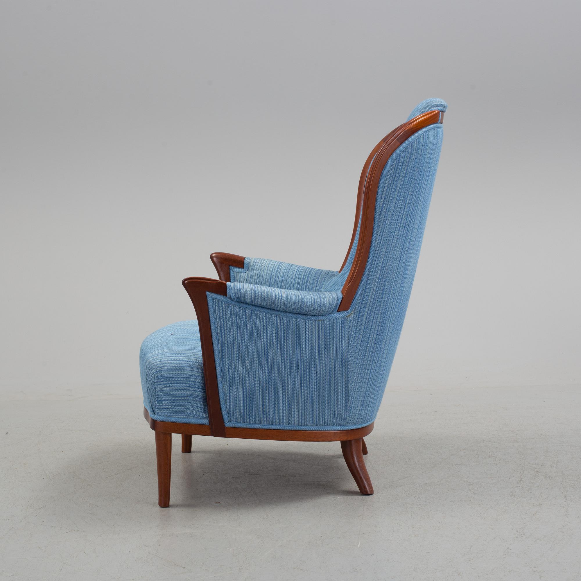 An "Vår Fru" armchair by Carl Malmsten.
