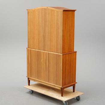 A 1960's walnut cabinet.