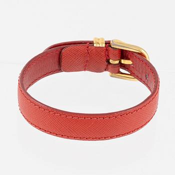Prada, a saffiano leather bracelet.