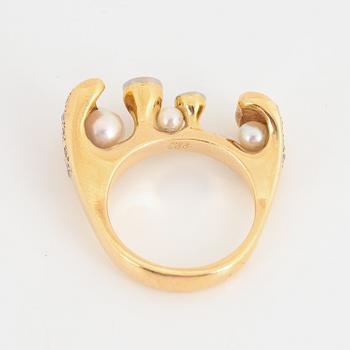 Brilliant-cut diamond and pearl ring.