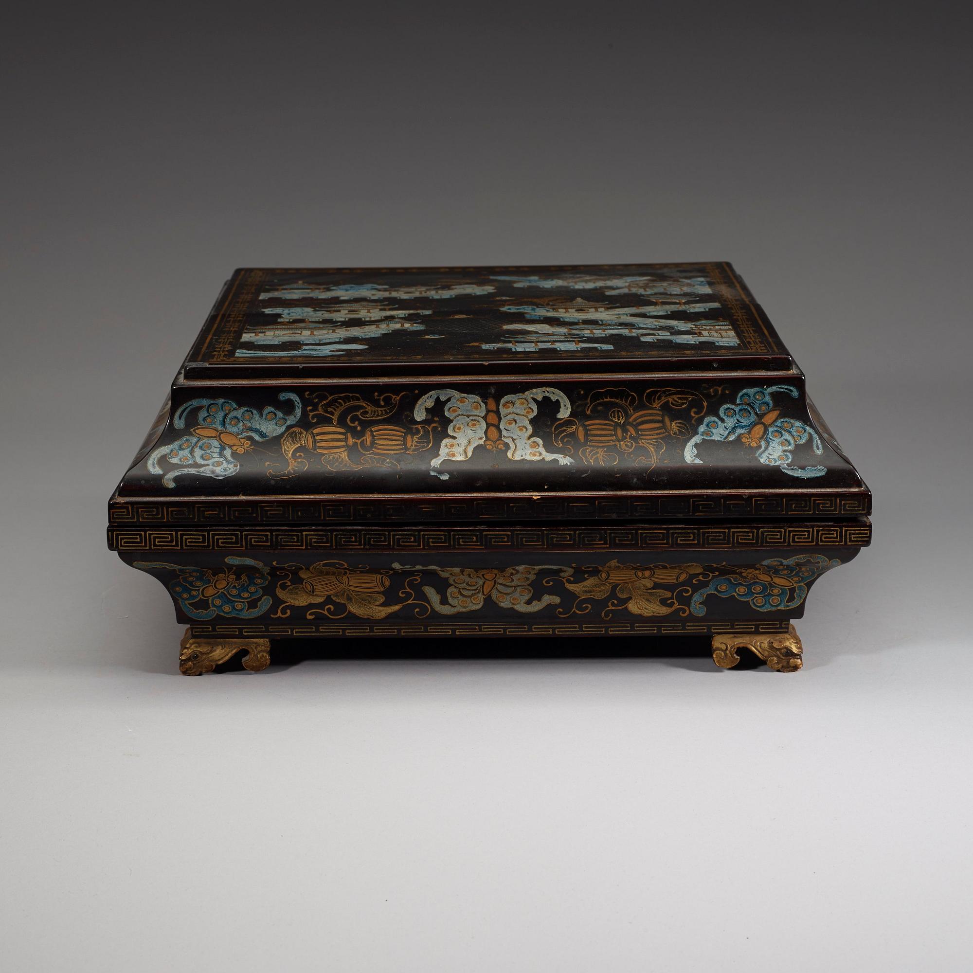 A black lacquer box and cover with a nine-piece cabaret, Qing dynasty, 19th Century.
