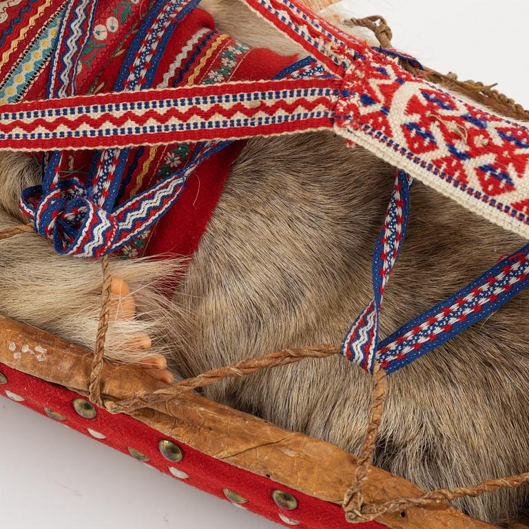 A Komsio, mid 20th Century.