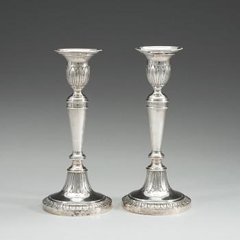 A pair of Russian early 19th century silver candlesticks, unidentified makers mark, Moscow 1807.