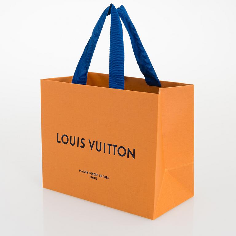 Louis Vuitton, 'La Boum' sunglasses and a Chouchou scrunchie.