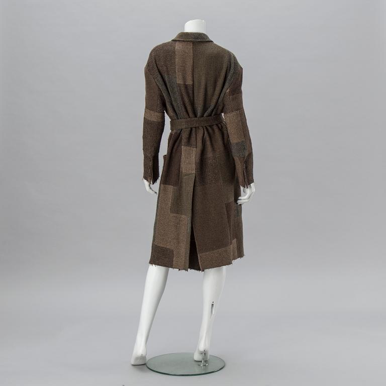 An oversize cashmere coat by Ralph Lauren.