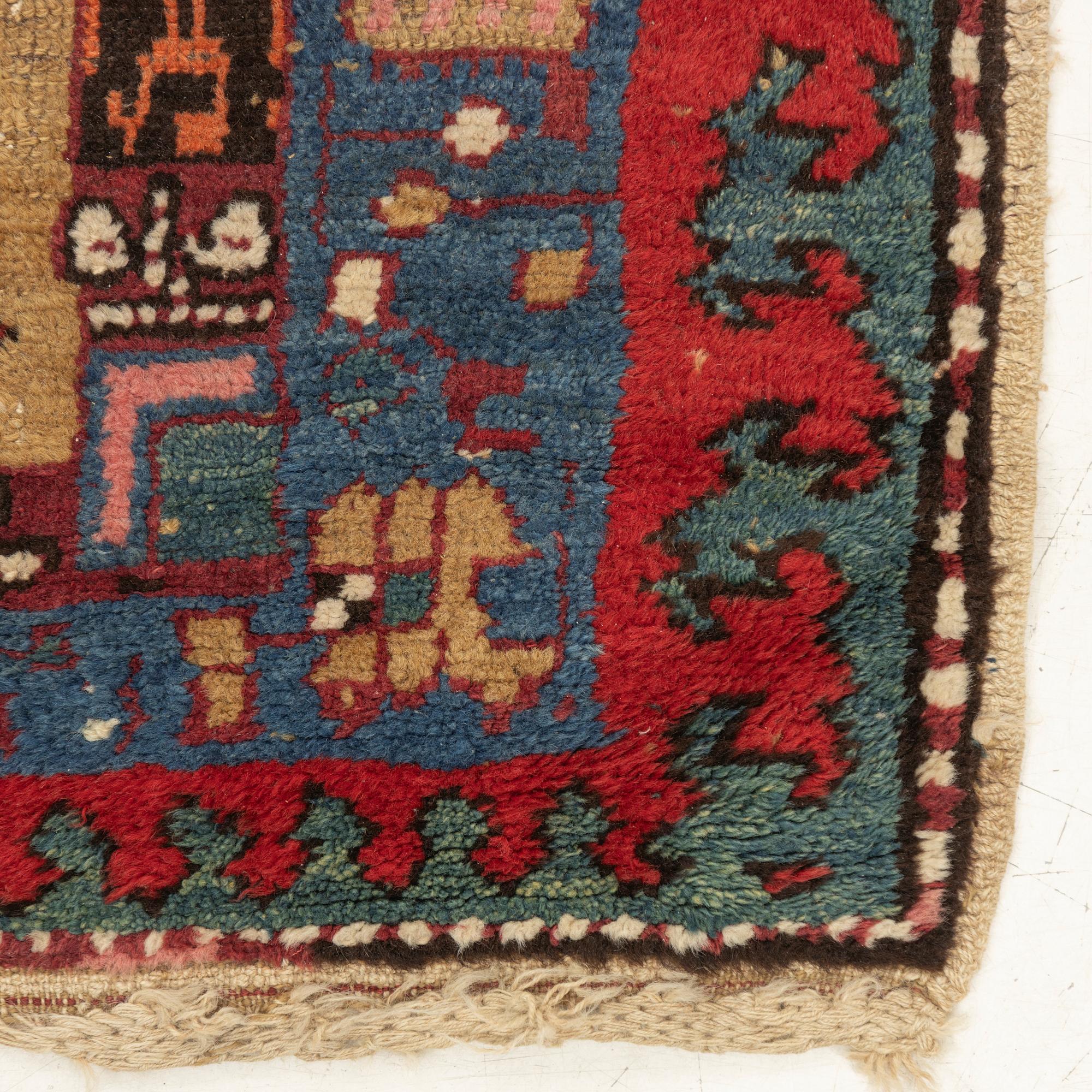 An antique Northwest Persian runner, c. 257 x 99 cm.